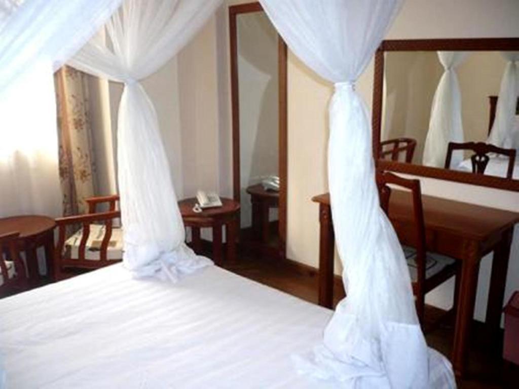 Arusha Tourist Inn Hotel Rum bild