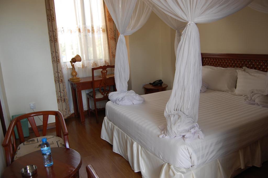 Arusha Tourist Inn Hotel Rum bild